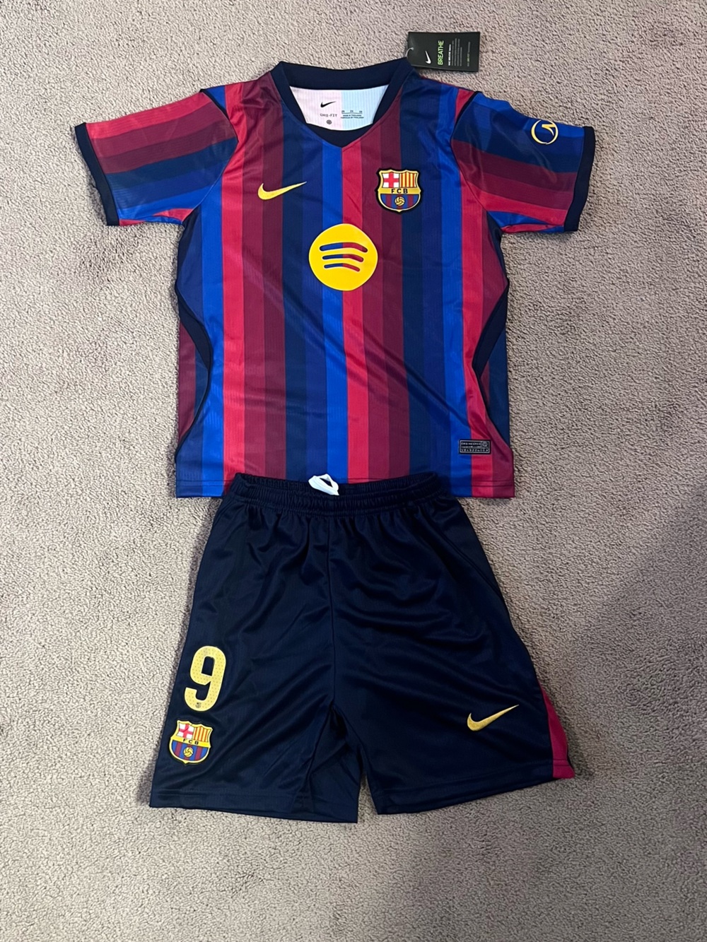 Nike Kids Black Soccer Shorts with Yellow Accents